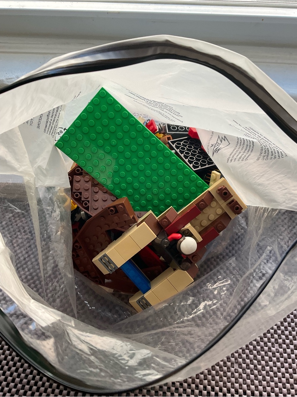 Lego Building Set Pieces with Green Plate and Brown/Tan Elements